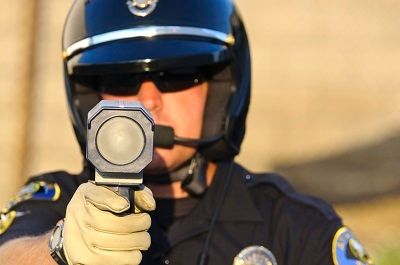 Cop-w-radar-gun_zpsewwlqv2w.jpg~original