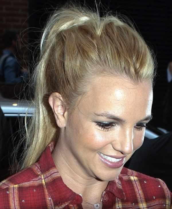 A fresh faced Britney Spears was all smiles when she landed in London