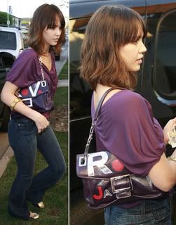jessica-alba-purple-roger-vivier-cut-up-bag.jpg picture by aminfuad